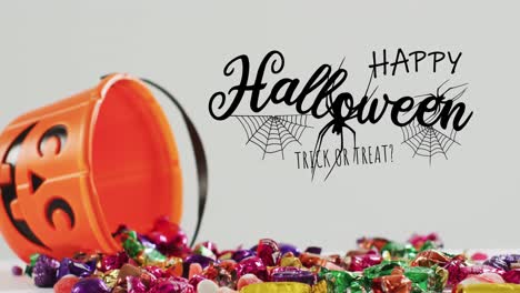 Animación-De-Texto-De-Halloween-Sobre-Cubo-De-Calabaza-Tallado-Con-Dulces-Sobre-Fondo-Gris