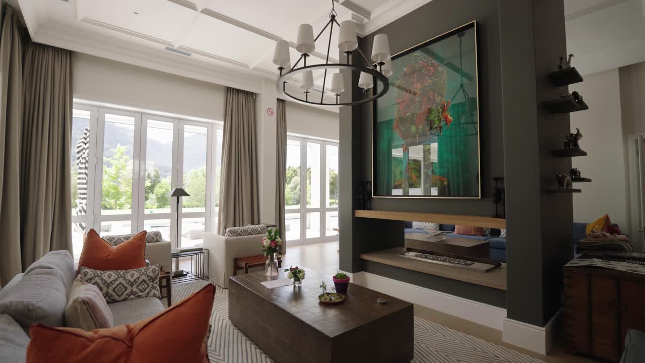 The living area showing expensive furniture within a luxury house with modern fixtures