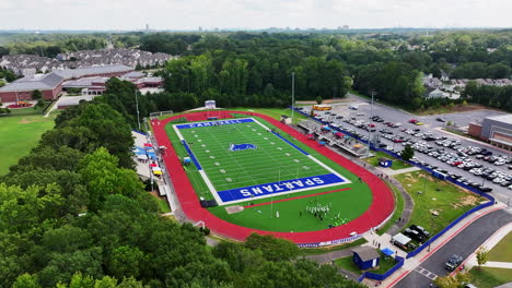 aerial footage of american football and athletic stadium