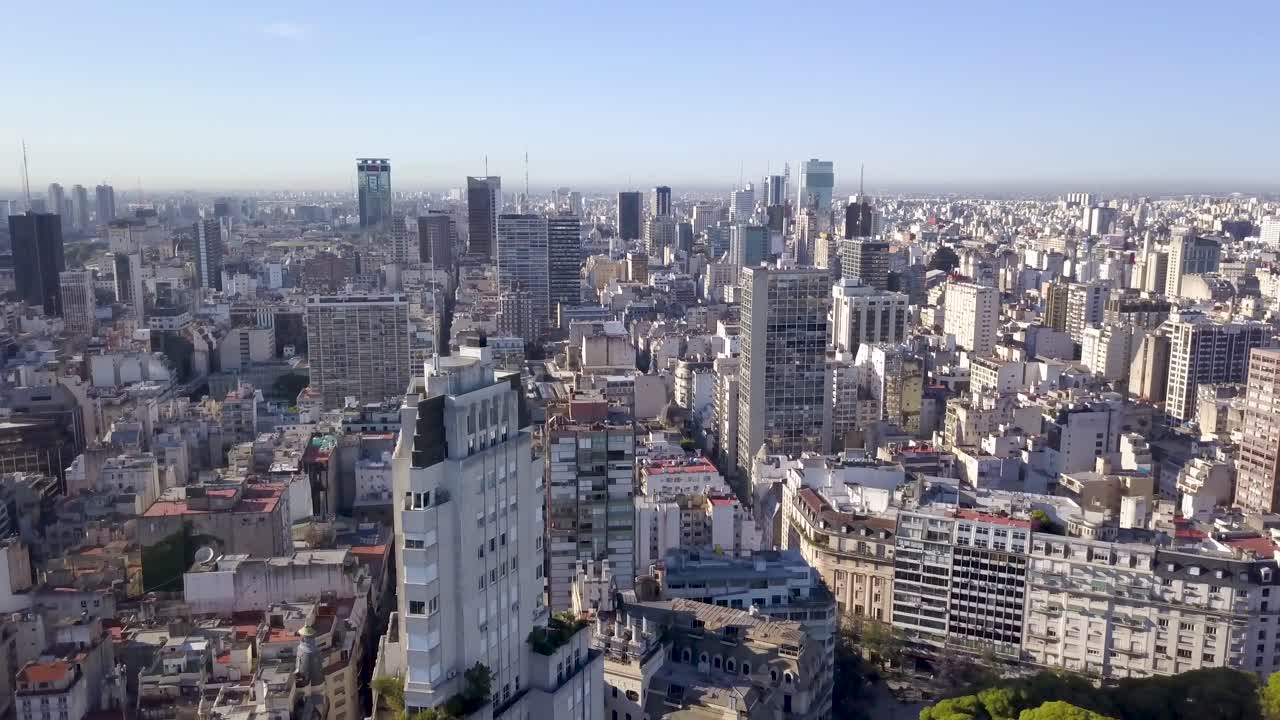 Aerial rising shot of Kavanagh building, revealing Buenos Aires skyline