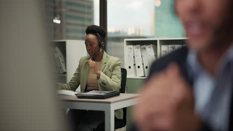 businesswoman working at her office desk