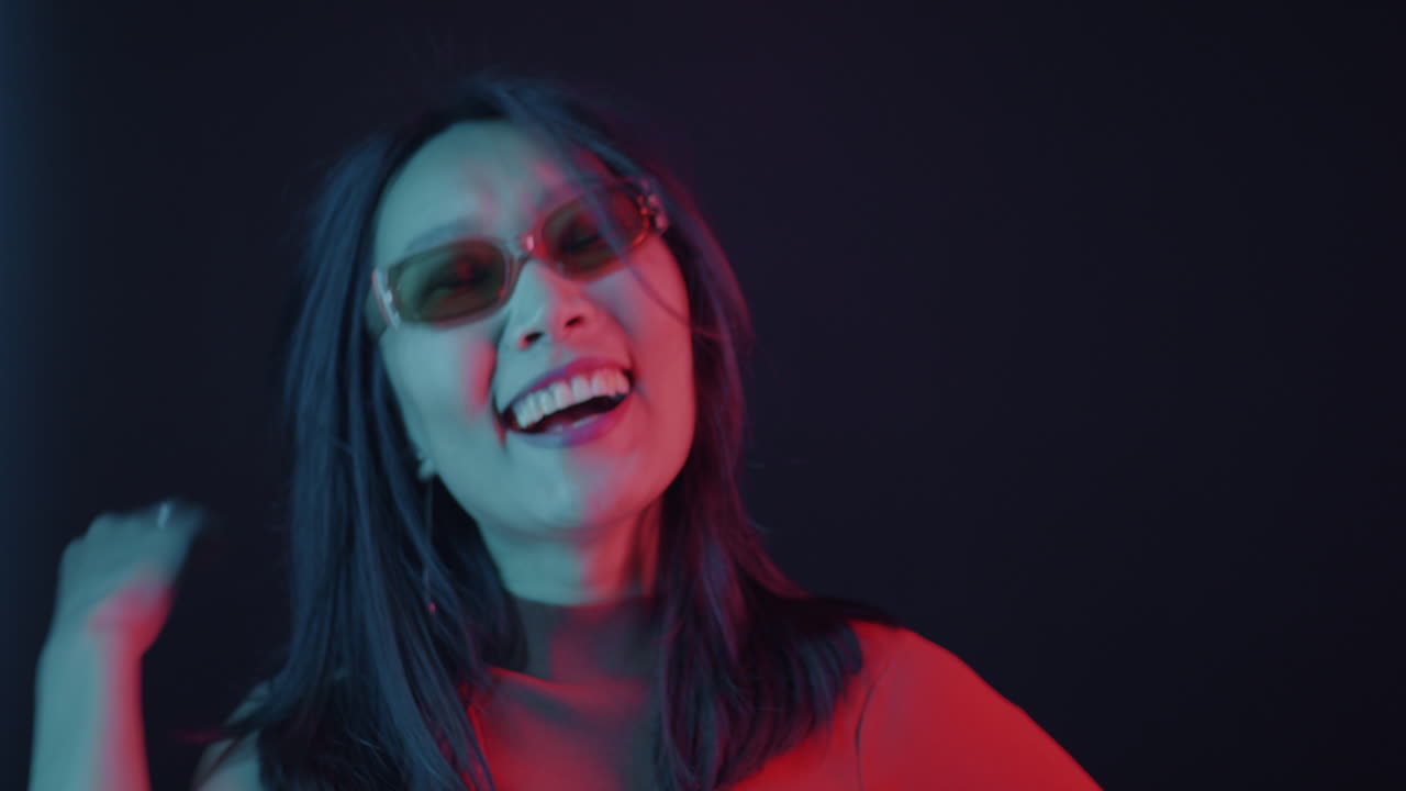 Stylish Woman in Neon Light