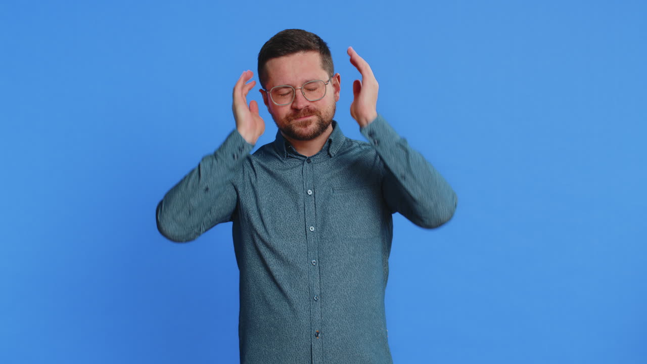 Annoyed irritated man covering ears gesturing no avoiding advice ignoring noise loud voices