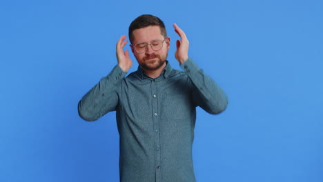 annoyed irritated man covering ears gesturing no avoiding advice ignoring noise loud voices