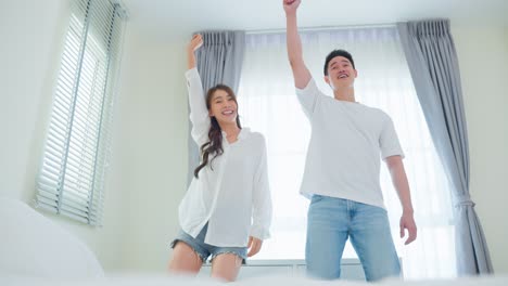 couple dancing in bedroom