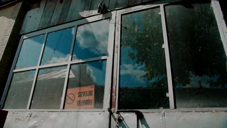 front doors of home workshop with glass windows, close up detail