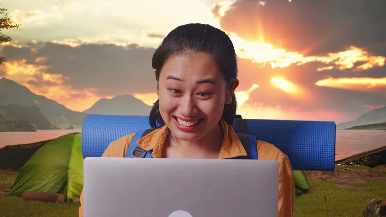 Happy Woman Celebrating Success on a Camping Trip