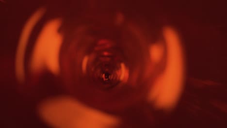 swirl in the water with red paint