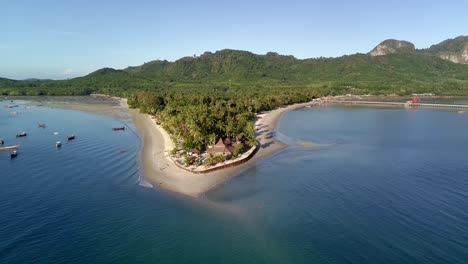 pull out drone shot of siwalai beach on koh mook tropical island in andaman sea in trang, southern thailand