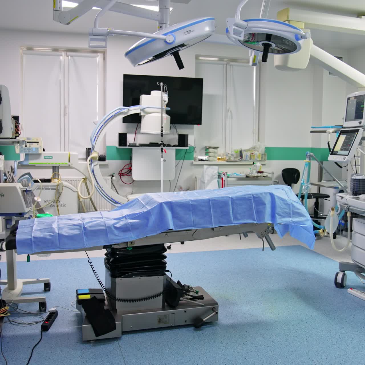 Empty surgery room with lots of advanced equipment. Operational theatre in modern clinics