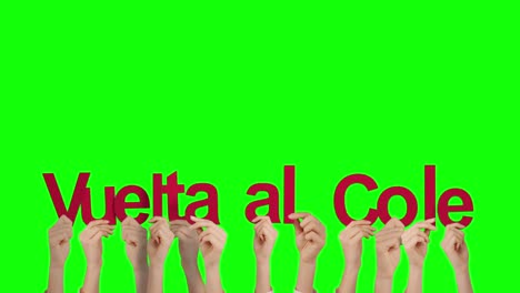 las manos levantadas vuelta al cole
