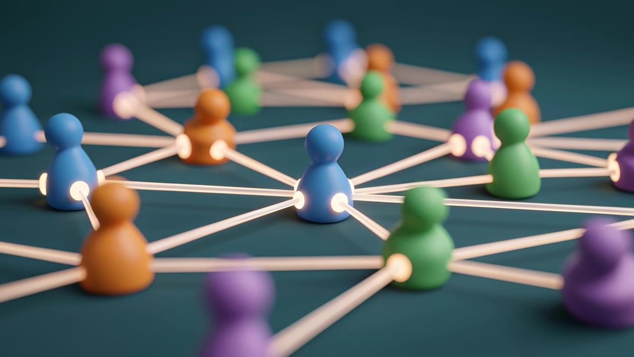 Colorful abstract figures representing people connected by glowing lines in a digital network concept