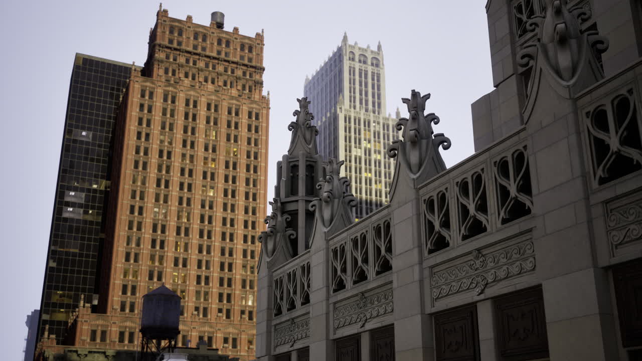 Historic architecture contrasts with modern skyline in urban setting