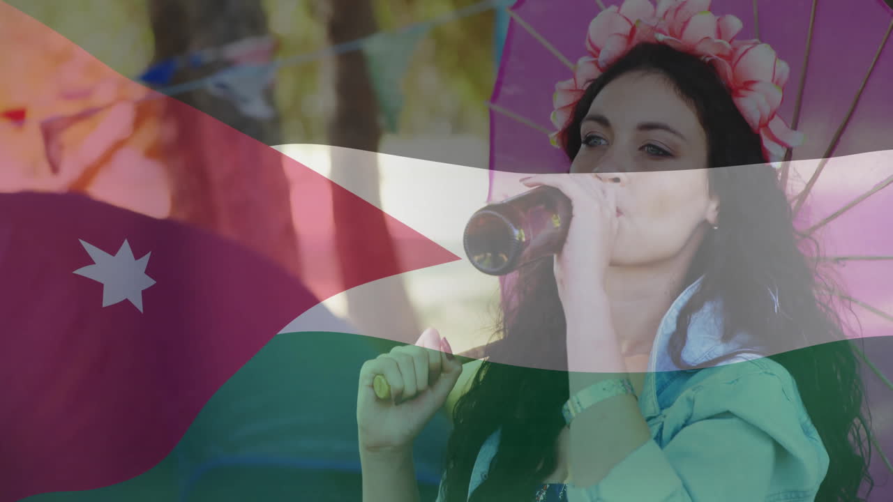 Drinking from bottle, woman sitting under umbrella with Jordan flag animation