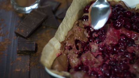 mixing dough for chocolate cake. cooking chocolate dessert. baking cherry cake