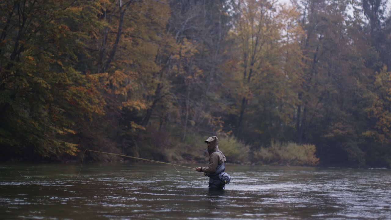 Autumn Fly Fishing on a Misty River