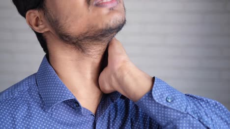 man checking his throat