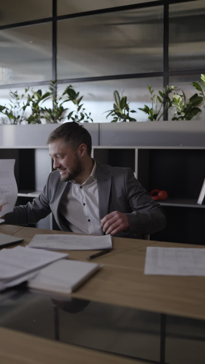 Frustrated Businessman Throwing Papers