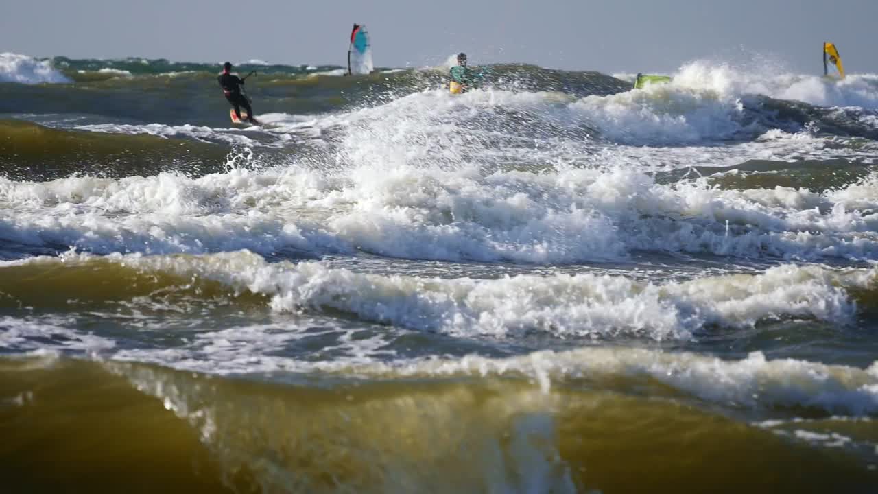 Kitesurfer Surfing on High Waves of Baltic Sea, Poland.