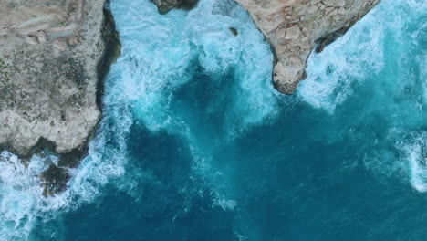 coastal waves crashing on rocky cliffs