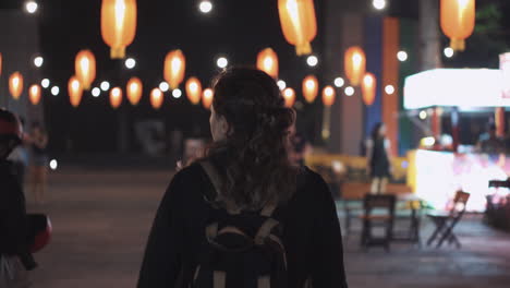 Woman at a Night Market