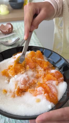 preparing egg yolks with sugar