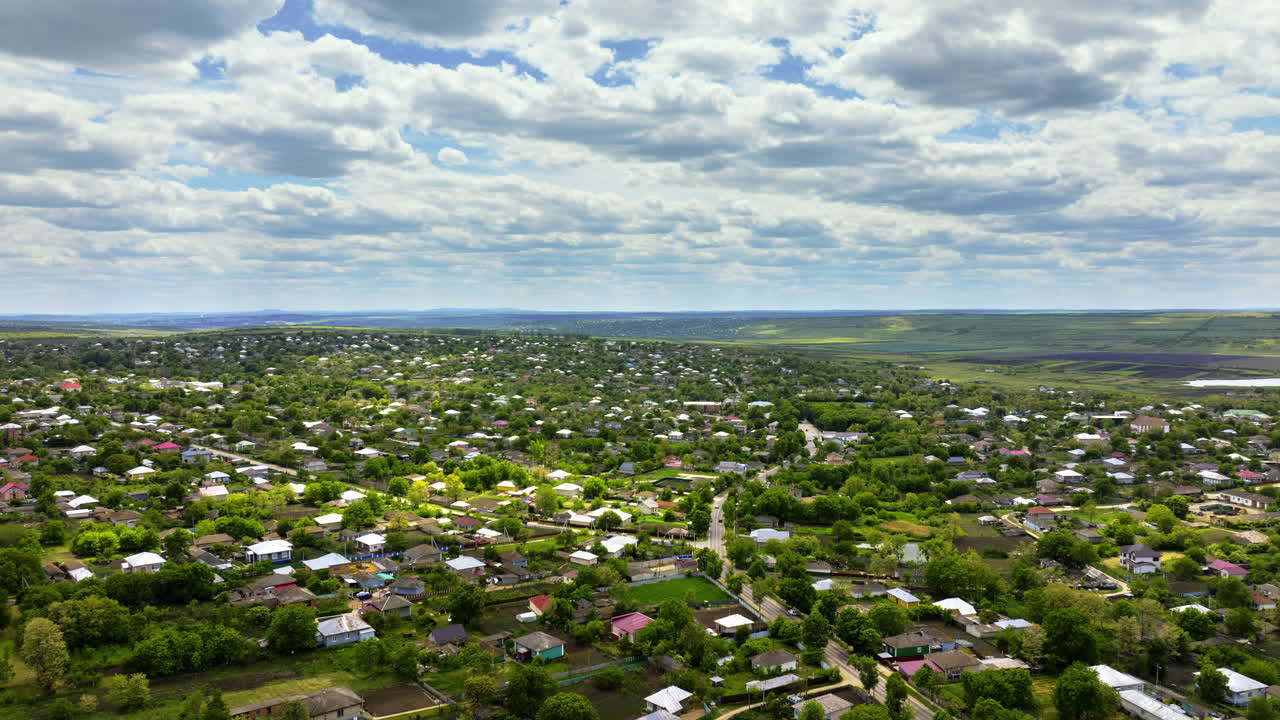 Aerial drone view of Pelinia, Drochia, Moldova with a cloudy sky