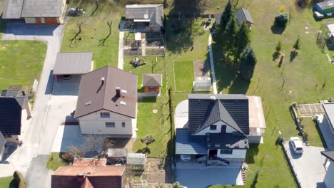 detached villa homes in typical slovenian village, top, aerial