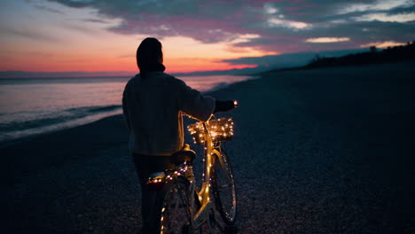 walking with glowing bicycle