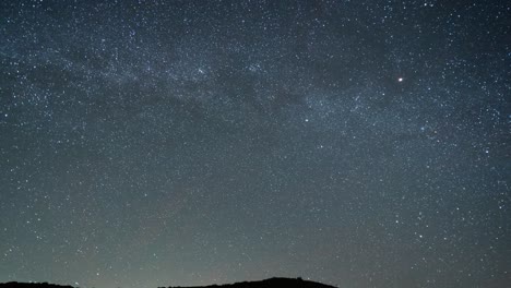 starry night sky with meteor