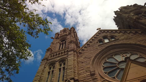 great summer day time-lapse of clouds passing the cathedral of the madeleine or st mary's cathedral in salt lake city utah