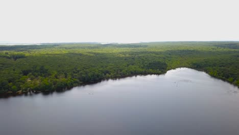 Aerial-view-of-forest-and-pond-in-Burlingame-Park-at-Charlestown,-Rhode-Island