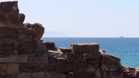 History-meets-paradise:-bask-in-a-breathtaking-seaview-framed-by-the-crumbling-majesty-of-Roman-ruins