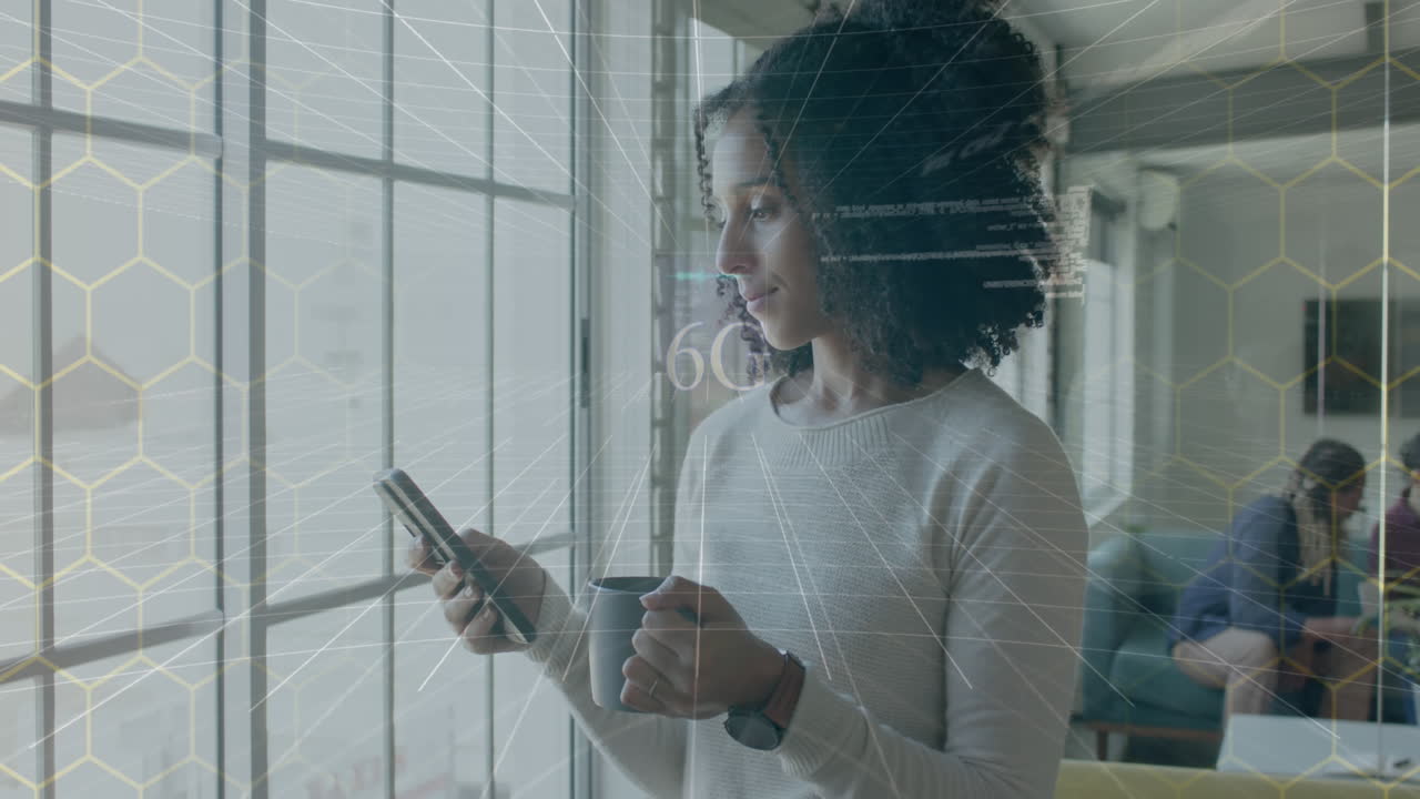 Animation of 6g text and data over biracial casual businesswoman using smartphone in office