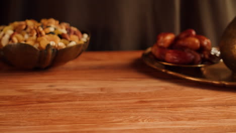 baklava on a tray, with hands