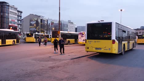 bus station in a city at dusk