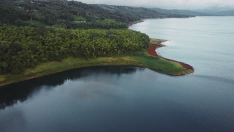 costa rica central america tropical scenic aerial landscape rain jungle forest and lake