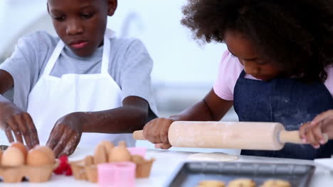 Brother-and-sister-making-cookies