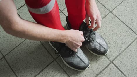 hockey player putting on his equipment