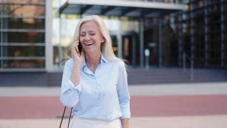 Businesswoman on phone in urban environment