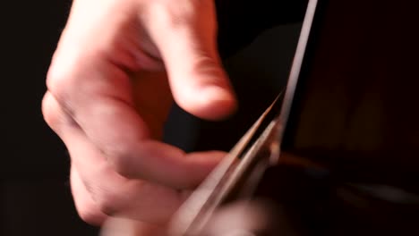 male guitarist hands playing music skillfully in a jam session