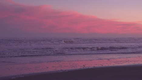 bright red sunset over the waves -wide