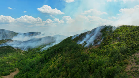 aerial: summer heat wave causing drought and wildfires on the mediterranean coast