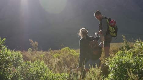 caucasian couple hiking in nature