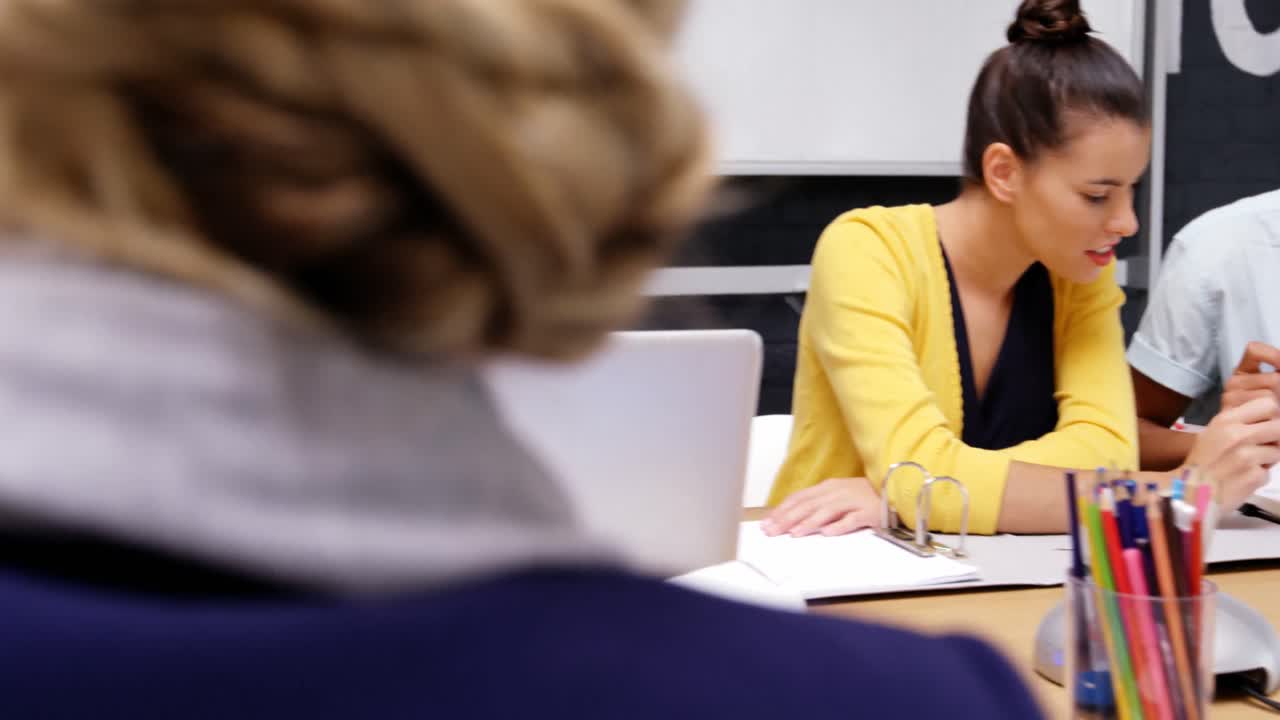 Business executives discussing during meeting