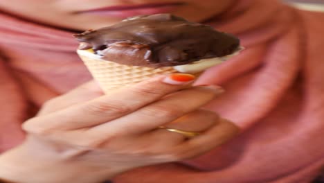 woman holding an ice cream cone