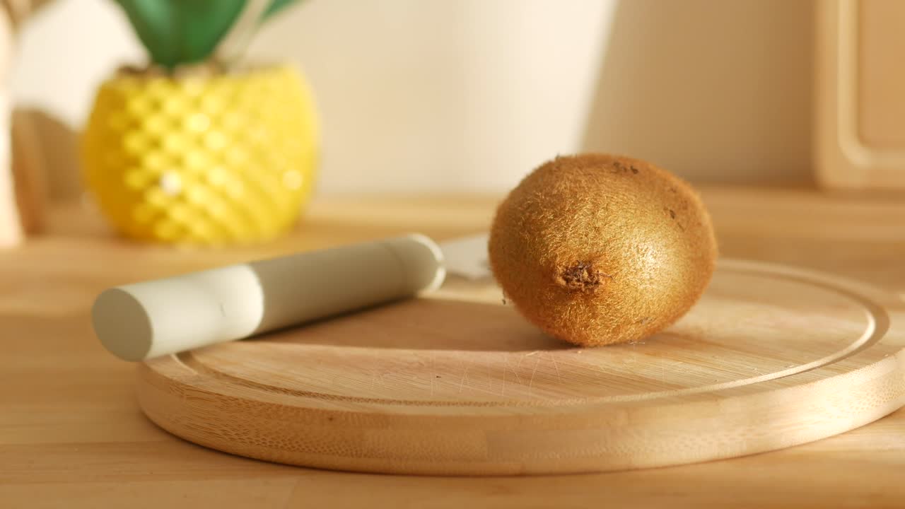 Kiwi and Pineapple on Cutting Board