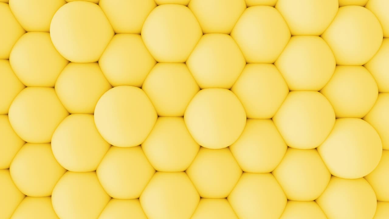 Abstract 3d shapes soft yellow balls wall animation. 4K looping footage.