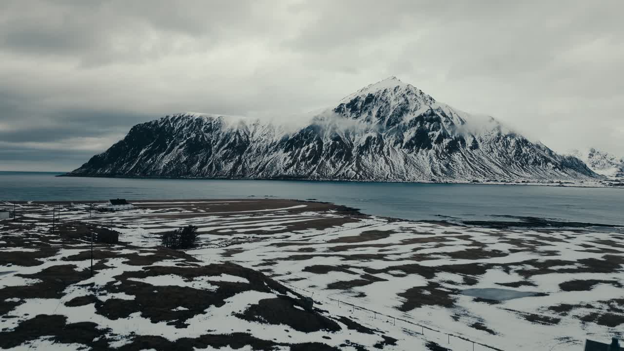 Winter Scene Of Lake And Mountains In Flakstad, Nordland County, Norway. Aerial Ascending Shot