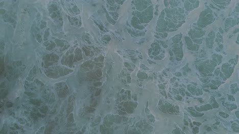 abstracto ojos de pájaros olas espumosas del océano